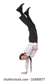 Businessman doing handstand and giving a thumbs up