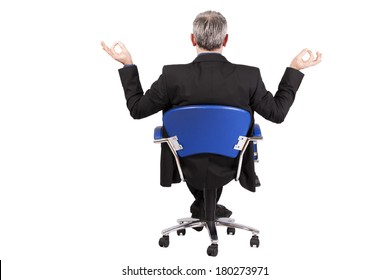 Businessman Doing Yoga In Office Chair Isolated