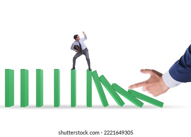 Businessman In Domino Effect Concept