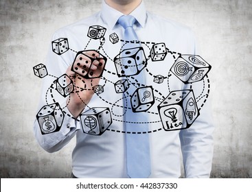 Businessman drawing abstract connected dice sketch on concrete background. Game and probability theory - Shutterstock ID 442837330