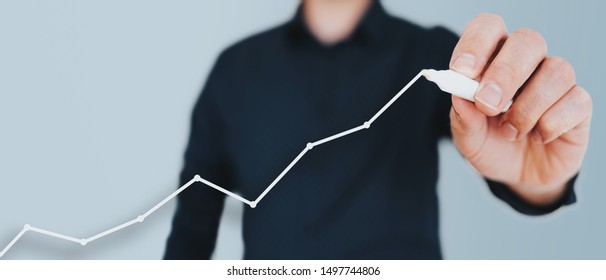 businessman drawing growth curve, growth forecast chart, bussiness success concept - Shutterstock ID 1497744806
