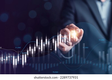 Businessman drawing line chart to increasing arrow investment finance economy. Capital gain world money economic growth. financial graph chart, market report on cash currency. - Powered by Shutterstock