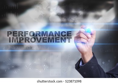 Businessman Is Drawing On Virtual Screen. Performance Improvement Concept.