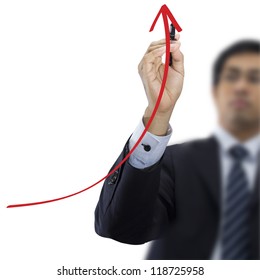 Businessman Drawing Red Arrow