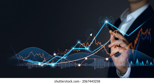 Businessman drawings growth graph of business. Business strategy development and growing growth plan. - Shutterstock ID 2067443258