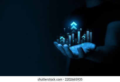 Businessman drawings growth graph of business. Successful business, growth strategy and achieving goals with the rising arrow.  Business strategy development and growing growth plan.  - Shutterstock ID 2202665935