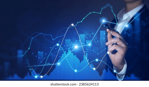 Businessman draws economic growth graph financial data.Stock market investment. Financial and banking Technology. Business strategy and digital marketing concept. - Shutterstock ID 2385624113