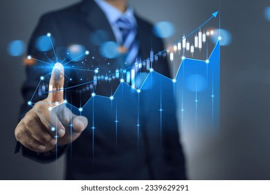 Businessman draws increase arrow with candle stock graph corporate future revenue growth year. Planning, increase opportunity, challenge business strategy goals plan vision for business competition - Powered by Shutterstock