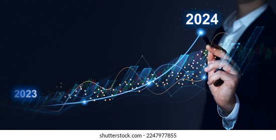Businessman draws increase arrow graph corporate future growth year 2023 to 2024. New Goals, Plans and Visions for Next Year 2024.Planning,opportunity, challenge and business strategy. - Shutterstock ID 2247977855
