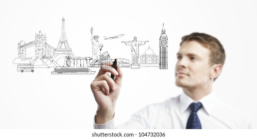 businessman draws outline a architectural buildings