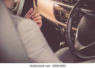 Businessman Driving The Luxury Car On His Morning Commute To Work. The Handsome Man Sitting In Automobile With Confidence In His Road Trip.