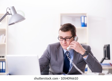 Businessman Employee Talking On The Office Phone