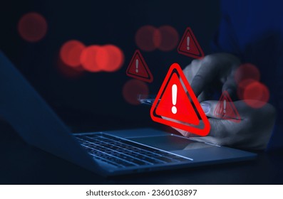 Businessman or employee with warning triangle sign for warning error Hack Alert System Warning cyber attack - Shutterstock ID 2360103897
