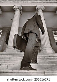 Businessman Entering Financial Building