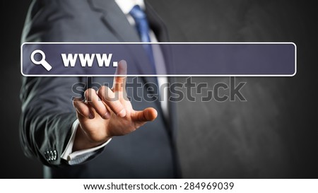 businessman entering a web address