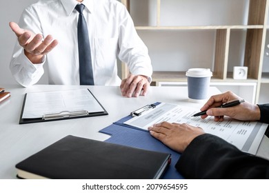 Businessman explaining about his profile to selection committee manager sitting in during job Interview, interview the job and hiring. - Shutterstock ID 2079654595