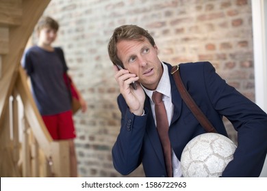 Businessman Father At Home Taking Teenage Son To School