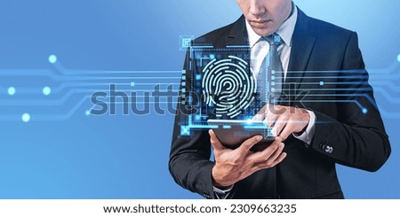 Businessman finger touch tablet, glowing fingerprint hud and circuit board. Biometric scanning, identification system hologram. Concept of cybersecurity, internet safety and data protection