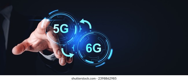 Businessman finger touching 5G and 6G icons, wide format on copy space empty background. Glowing hologram with futuristic internet connection and digital technology