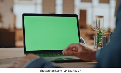 Businessman fingers scrolling mockup laptop touchpad working remotely at home closeup. Unknown manager hands surfing internet information online swiping pc. Worker touching chromakey computer  - Powered by Shutterstock