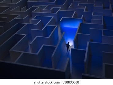 Businessman with flashlight walking through maze - Powered by Shutterstock