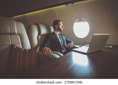 Businessman Flying On His Private Jet