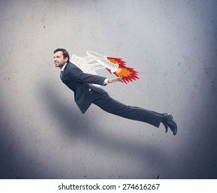 Businessman Flying With Rocket Backpack