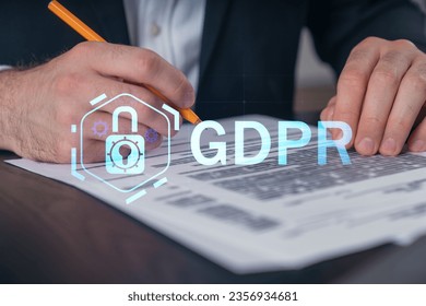Businessman in formal wear taking notes signing contract at office workplace. Concept of important working moments, document sign, working process, concentration. Hands shot. GDPR hologram
