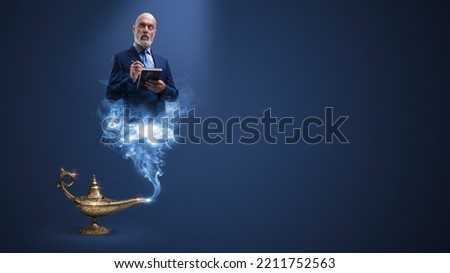 Businessman genie coming out from the lamp and writing notes, blank copy space Stok fotoğraf © 