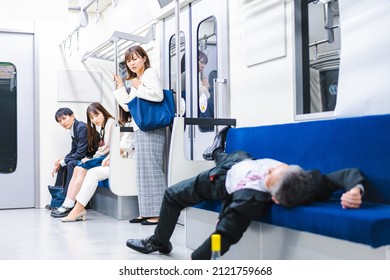 Businessman Getting Drunk On The Train