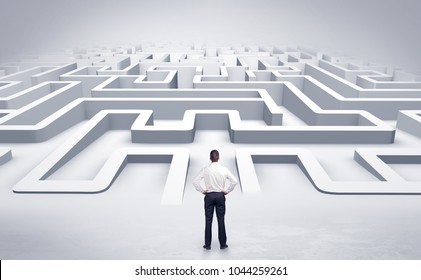 Businessman getting ready to enter a 3D flat labyrinth concept