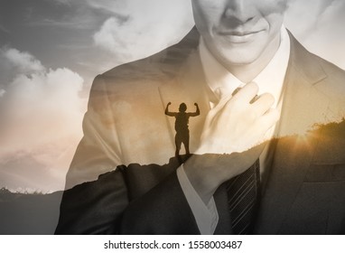  Businessman getting suited up ready for success at work. People finding your inner strength, and never giving up concept. Double exposure.  - Shutterstock ID 1558003487