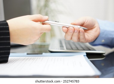 Businessman Give Client Pen To Sign The Contract In Office