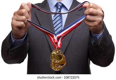 Businessman giving gold medal prize for success in business