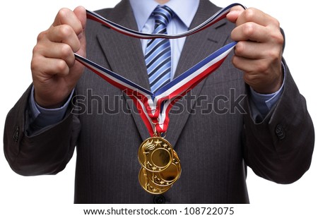 Businessman giving gold medal prize for success in business