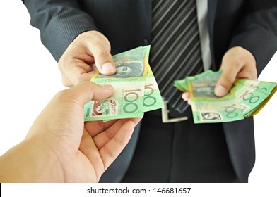 Businessman giving money - Australian Dollar Bills