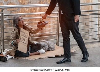 7 Businessman Giving Money To Pity Beggar. Rich Man Donate One Dollar ...