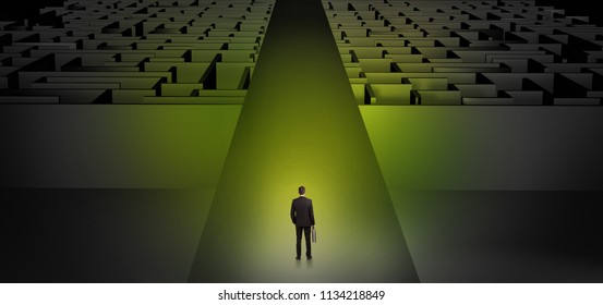 Businessman Going Straight Ahead On A Wide Road Between Dark Mazes