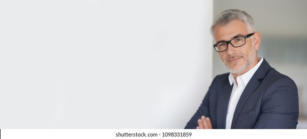Businessman in grey suit, isolated
