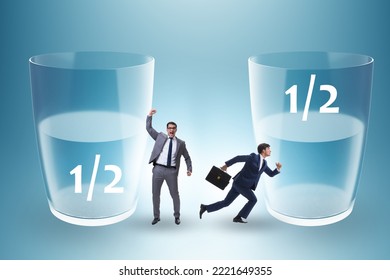 Businessman In Half Empty Half Full Glass Concept