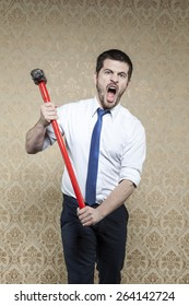 Businessman With A Hammer Seems Battle Cry