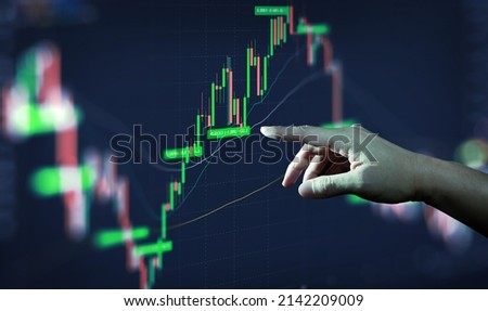 Similar – Image, Stock Photo Stock broker trading online watching charts and data analyses on multiple computer screens.