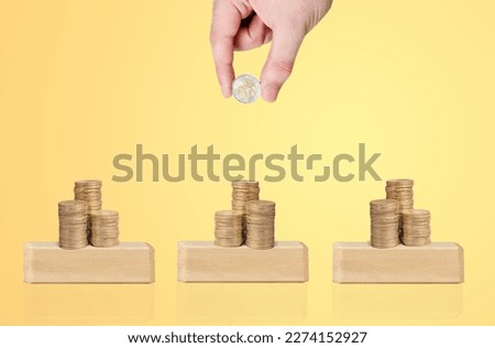 businessman hand with coins for investment concept