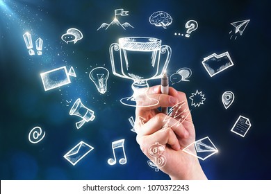 Businessman Hand Drawing Creative Leadership Business Sketch On Blurry Background. Winner And Award Concept 