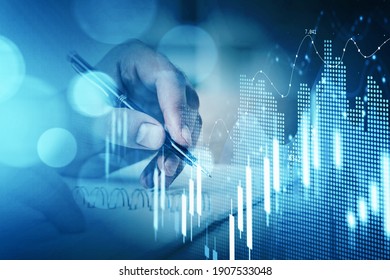 Businessman hand drawing virtual chart or collect stock market rates into notebook to make a forecast. Double exposure. The concept of successful investment decision