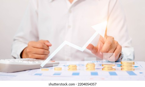 Businessman Hand Drawing Virtual Increasing Graph, Money Coins Stacking , Check The Movement Of The Currency, Business Investment Profit And Deposit Dividend Saving Growth.