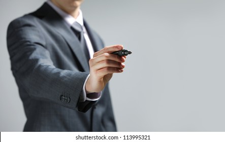 Businessman Hand Drawing In A Whiteboard, Copy Space