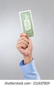 Businessman Hand Hold With One Dollar