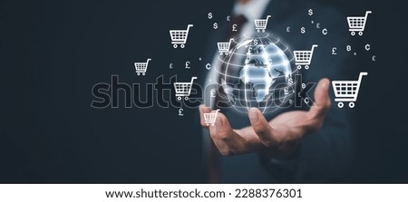 Businessman hand hold virtual world online shopping concept, marketplace website with virtual interface of online Shopping cart part the network, Online shopping business with selecting shopping cart.