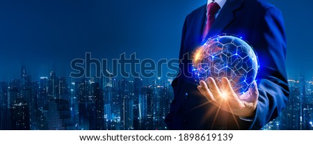 Businessman hand holding blue earth and global networking connection,blockchain,virtual technology,big data,iot,rpa,artificial intelligence(ai),network concept,Elements of this image furnished by NASA